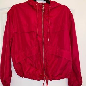 Size small women’s hooded rain jacket.